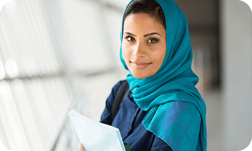 Student holding study documents