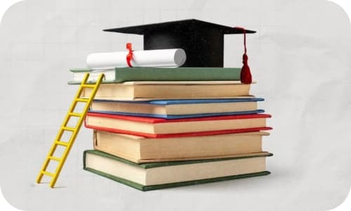 Books, graduation cap and scholarship scroll